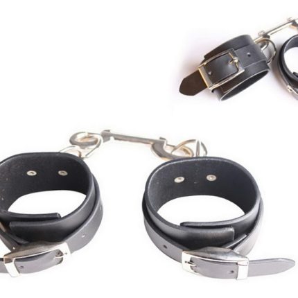 Leather Handcuffs. Adjustable Straps With Metal Fittings.